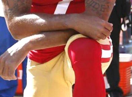 Taking a knee while taking a stand