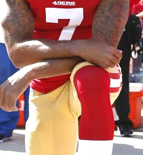 Taking a knee while taking a stand